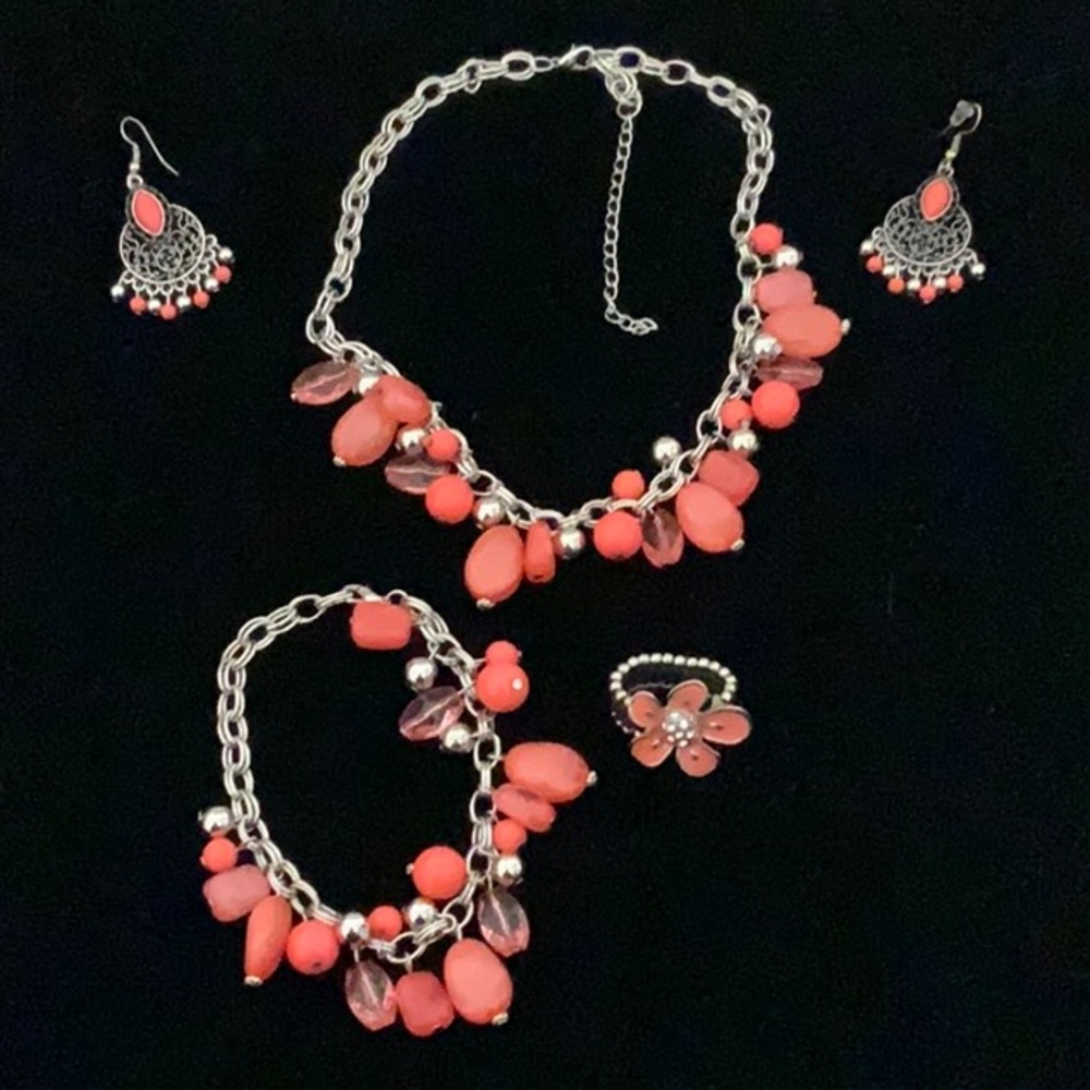 Jewelry set Includes adjustable necklace bracelet earrings and stretch ring
